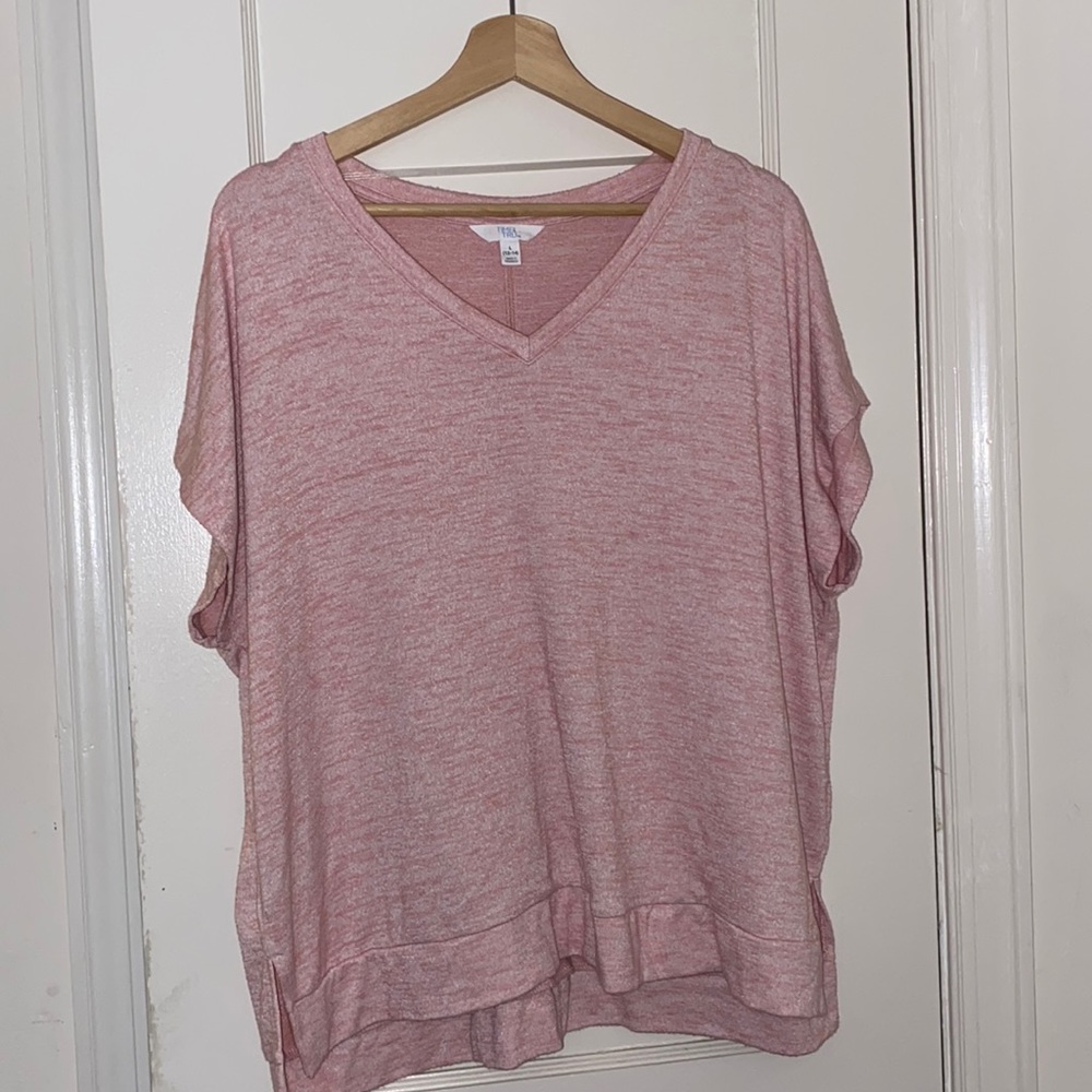 Pink T-shirt. Pretty spacious for a Large.